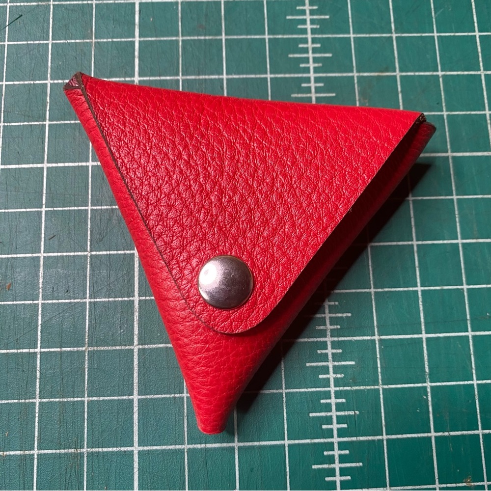 Limited availability Red pebble leather triangle coin pouch pink interior 3.75”